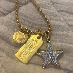 Coach Gold-tone Tag Necklace with Crystal Star Charm